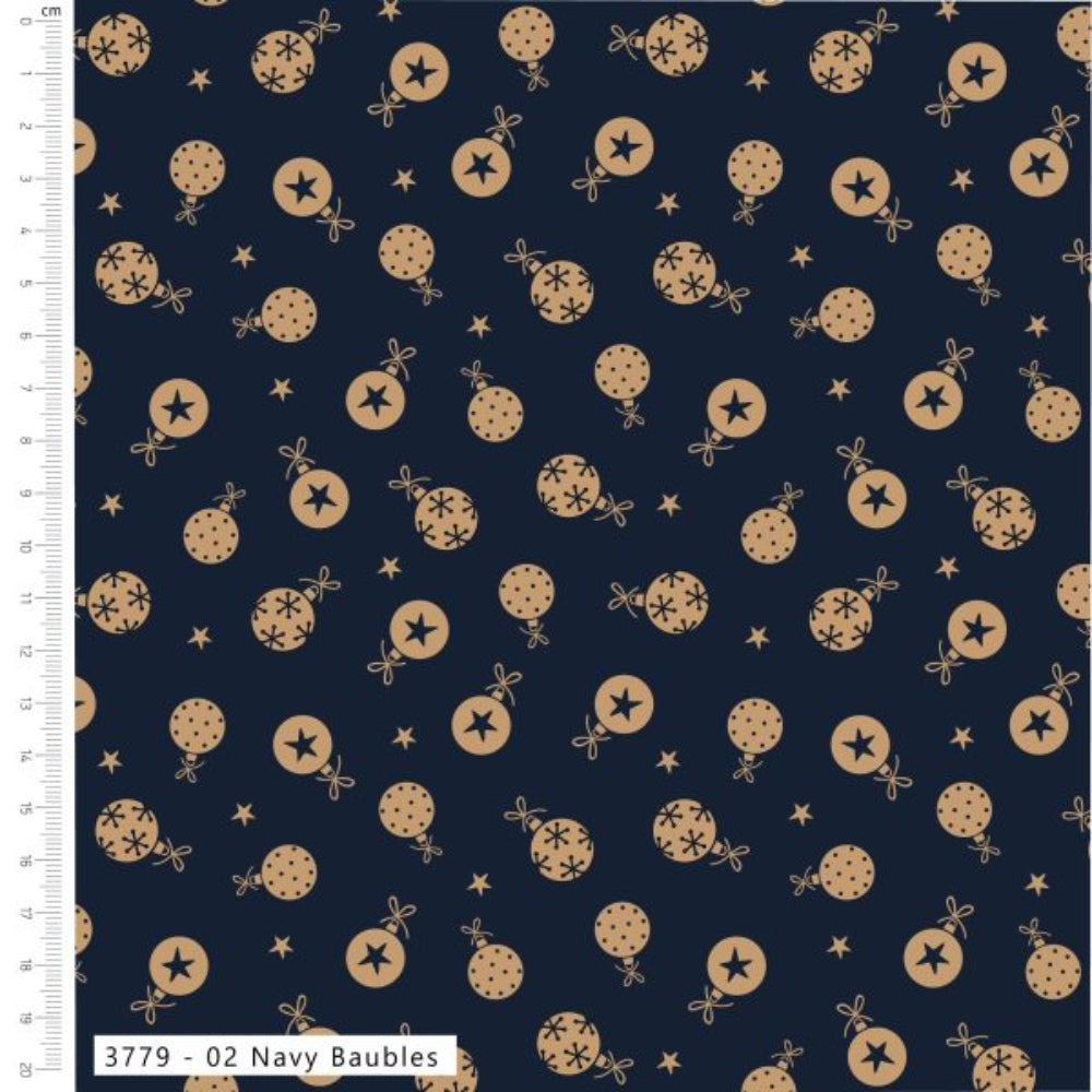Navy blue fabric with a repeating pattern of gold baubles and stars, shown with a white measurement ruler on the left side.