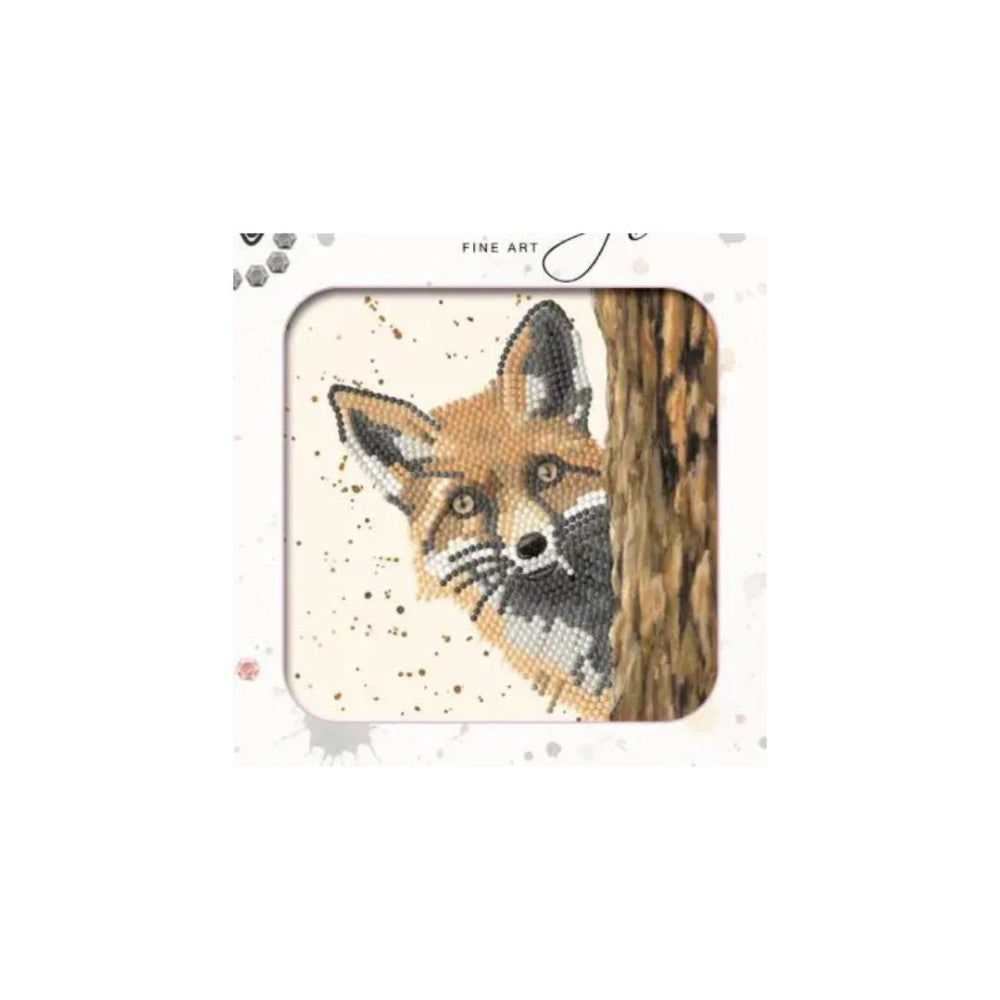 A square canvas or print featuring a painted fox peeking from behind a tree trunk, shown centered on a white background with decorative text at the top that reads 'FINE ART'.