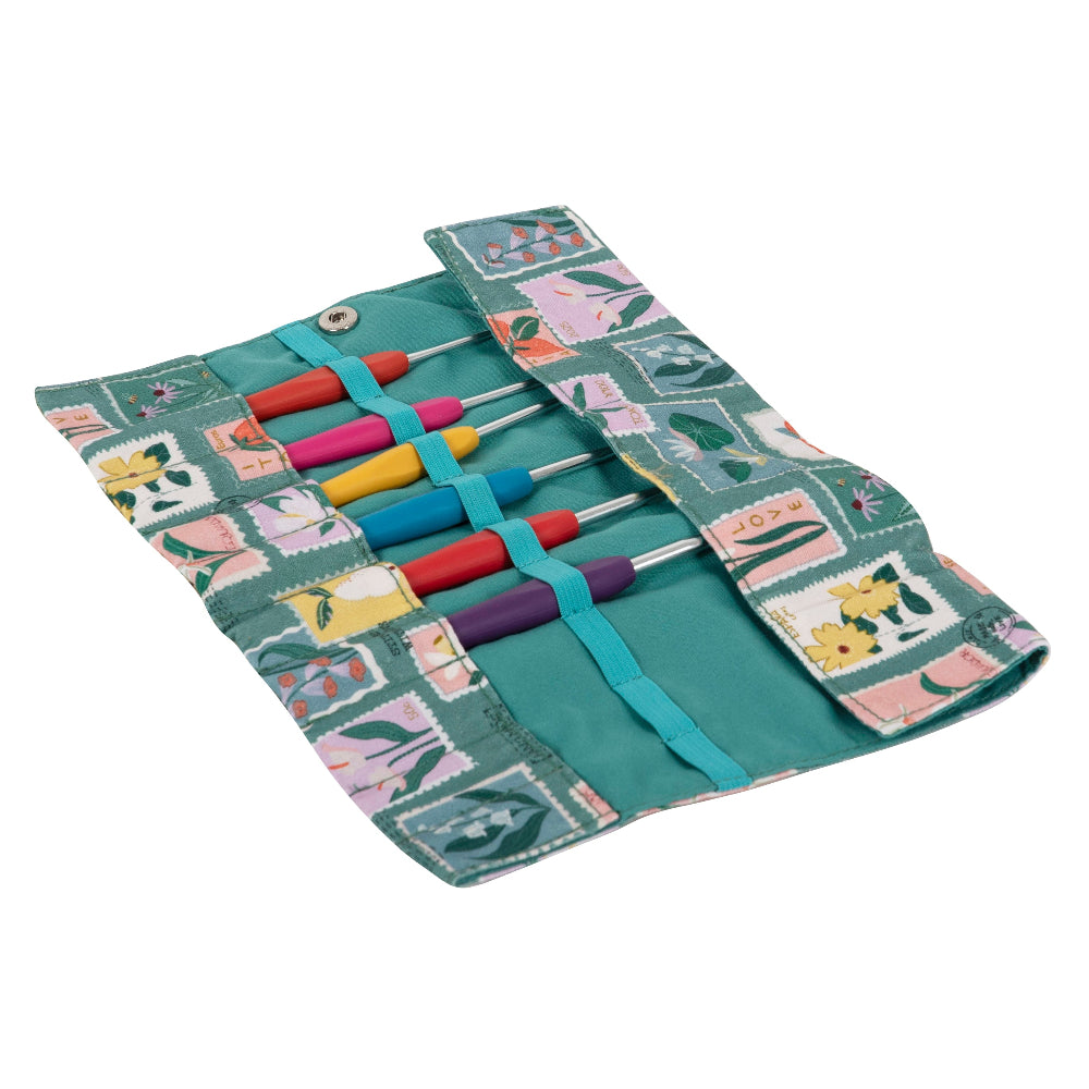 Crochet Case Wrap with Embroidered Stamps Design Inside