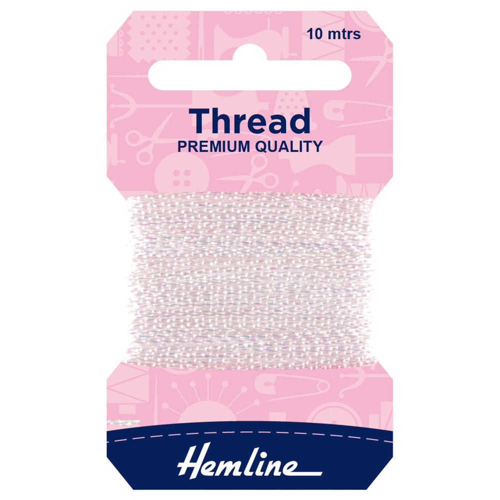 A package of Hemline sewing thread, 10 meters long, wound on a cardboard spool with a pink header card and a navy blue brand label at the bottom.