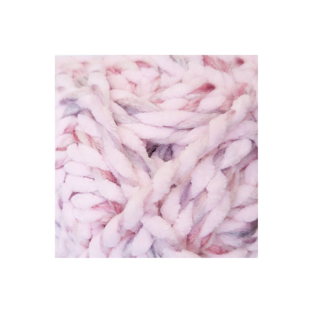 Chunky variegated yarn in a soft pastel mix of pink, white, and light purple, shown in a close-up texture shot on a white background.