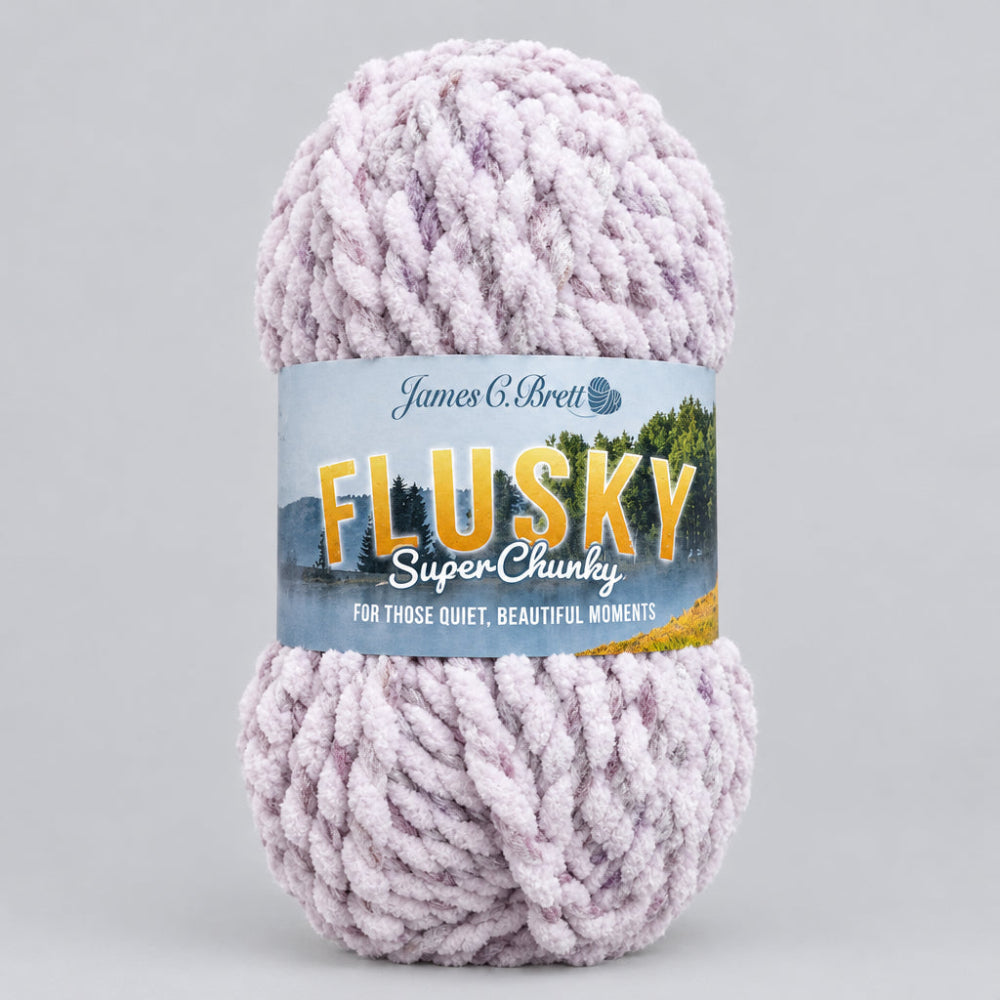A large ball of James C. DBrett 'Flusky' Super Chunky yarn in a soft, pale pink and white variegated colour.