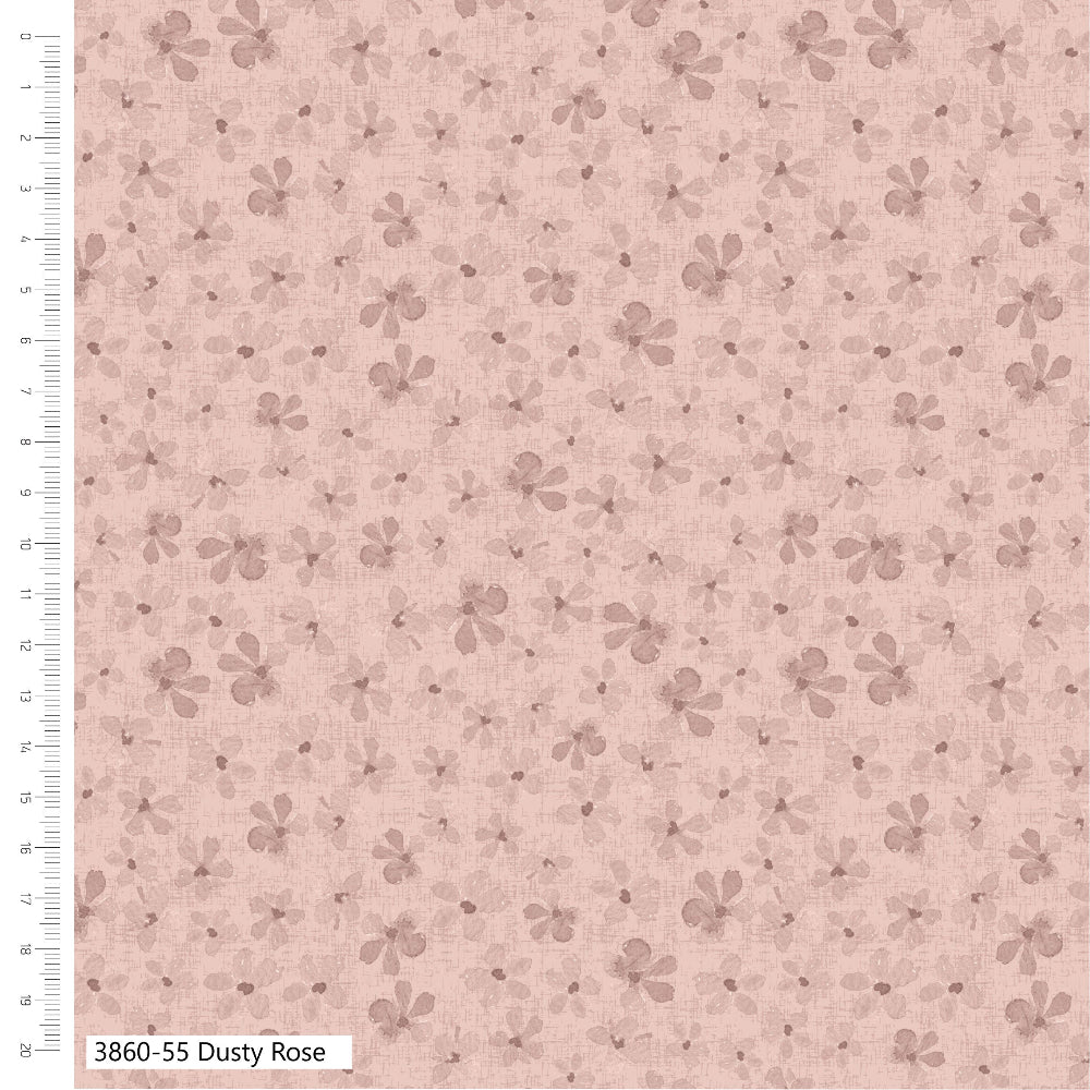 Floral patterned fabric with a ruler on the side on a pink background
