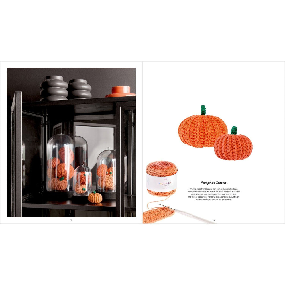 A catalog-style layout showing crocheted orange pumpkins and a matching yarn ball with a crochet hook on a white page, alongside a lifestyle photo of similar pumpkins displayed inside glass cloches on a dark cabinet.
