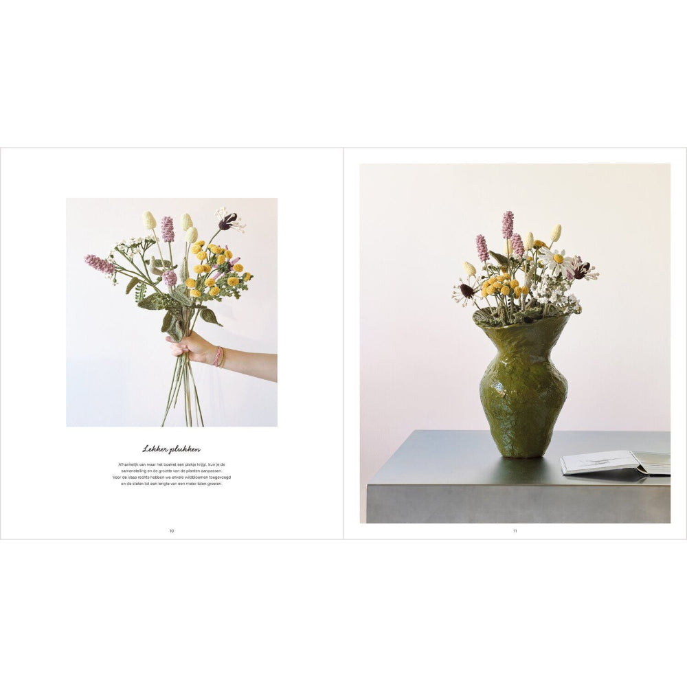 A two-page spread showing a vase arrangement of mixed wildflowers. The left page includes a hand holding a bouquet, and the right page shows the same bouquet arranged in a textured green ceramic vase on a gray pedestal against a pale pink background.