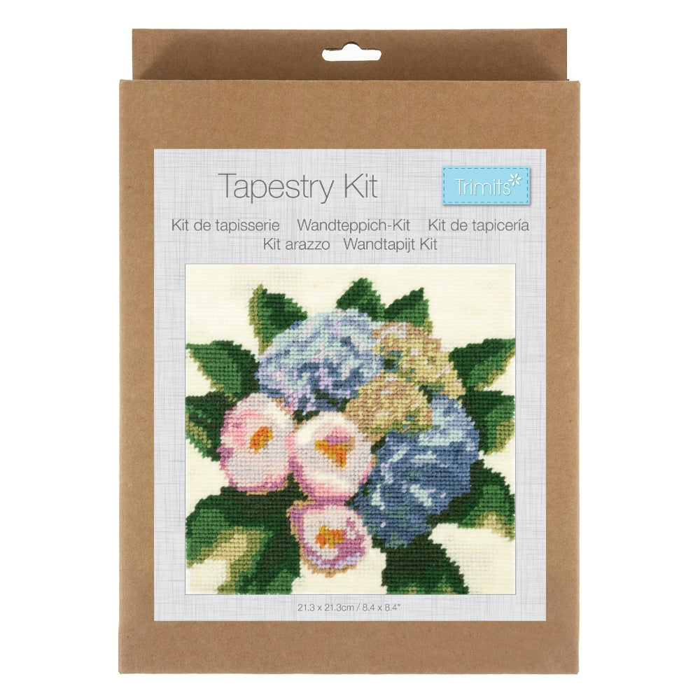 Tapestry kit packaging with floral design and brand label on a white background