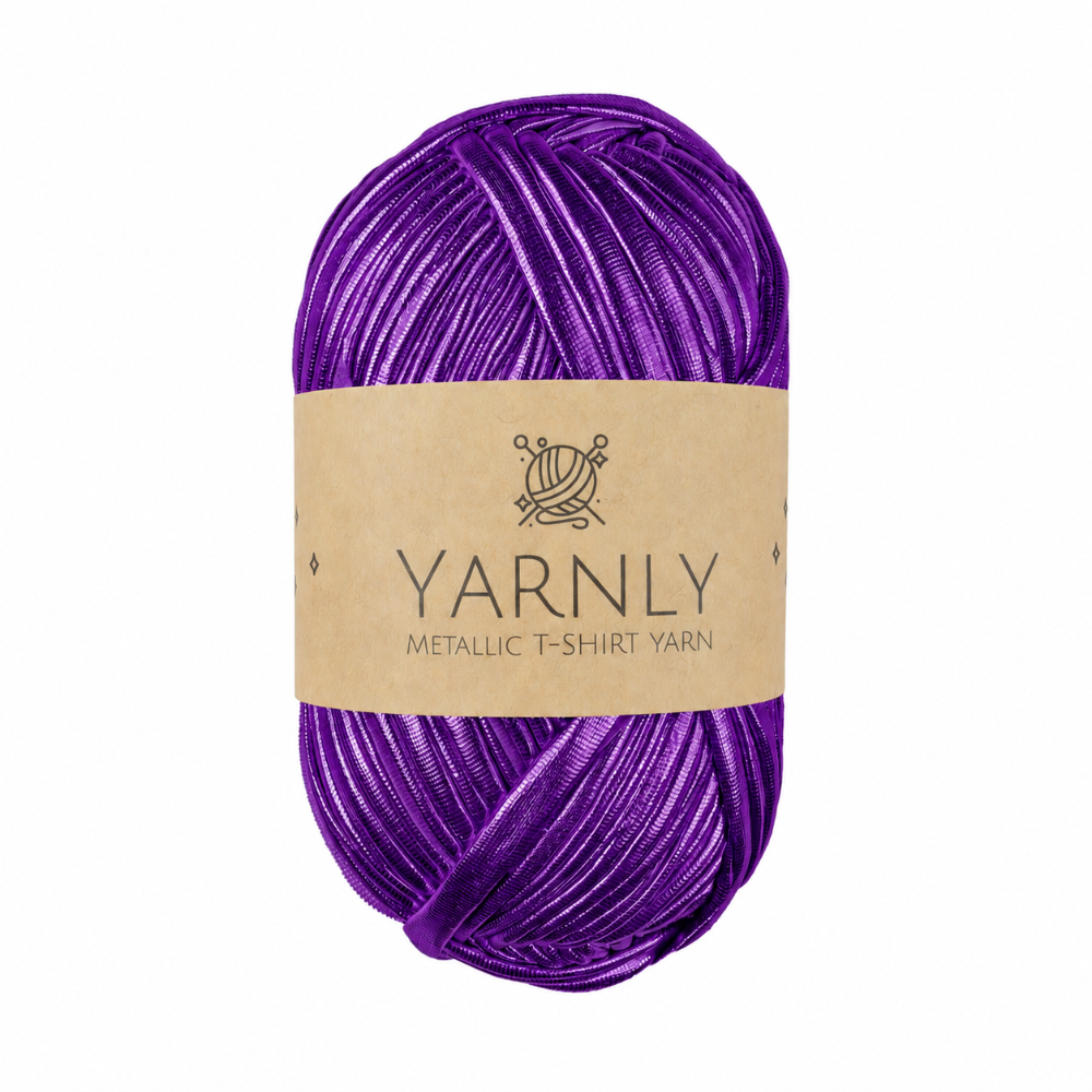 A skein of metallic purple yarn with a brown paper label reading 'YARNLY METALLIC T-SHIRT YARN' on a plain white background.