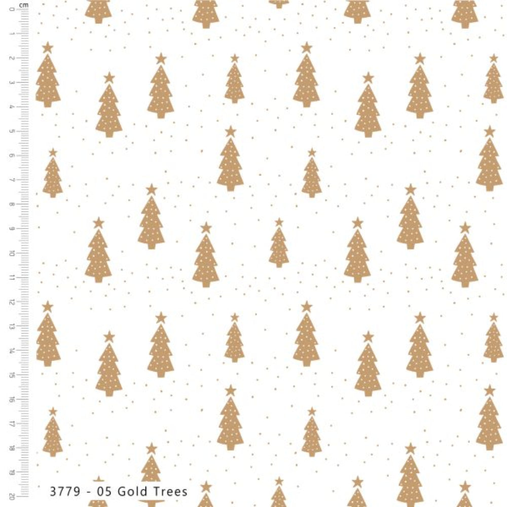 White fabric with a repeating pattern of gold Christmas trees and small gold stars, shown with a measurement ruler on the left side.
