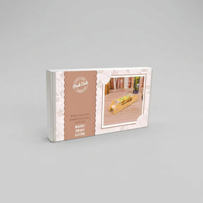 Packaging box for the 'Basic Bead Loom' by Peak Dale Products, featuring a brown and white design with a small inset photo of the wooden loom in use.