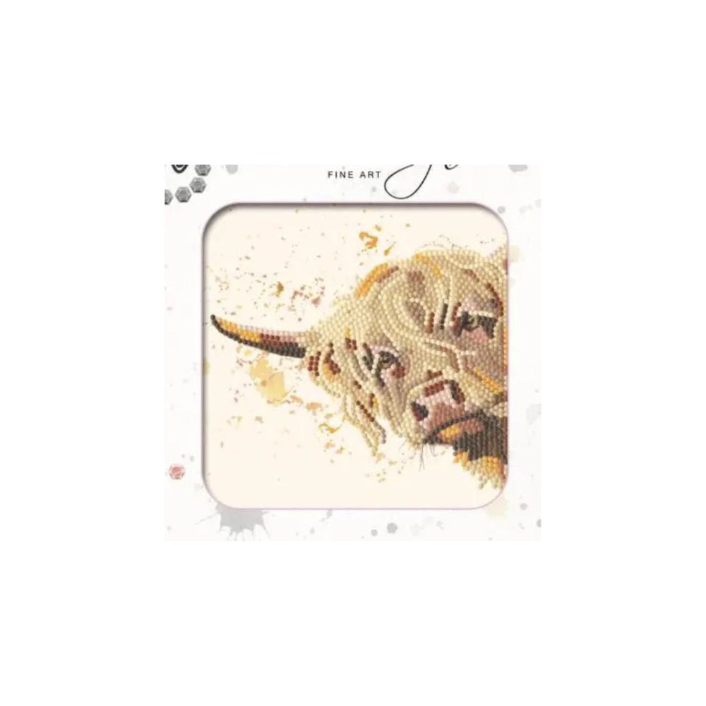 A square compact or palette featuring a stylized bull illustration made from many small gold-toned dots on a cream background, with the words 'FINE ART' printed near the top.