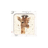 A square framed art print featuring a painted giraffe head on a light cream background with subtle paint splatters. The print is presented in a white frame with decorative gray and black accents, and the words 'FINE ART' are printed at the top.
