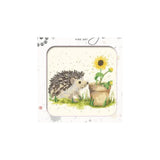 A square framed art print featuring a stitched-style illustration of a hedgehog beside a sunflower in a basket pot, with the words 'FINE ART' at the top, shown on a plain white background.