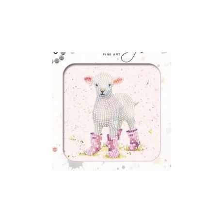 A square framed art print featuring a white lamb wearing pink rain boots on a light pink watercolor background, with the words 'FINE ART' printed at the top.