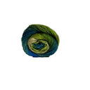 A single ball of variegated yarn with a colour gradient transitioning from olive green to teal blue and dark navy, set against a plain white background.
