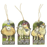Three arched gift tags with hanging twine, each featuring a watercolor-style sheep illustration and a humorous quote on a white background.