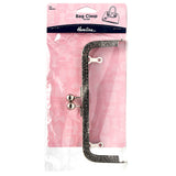 Bag clasp with pink packaging featuring Hamline branding on a white background