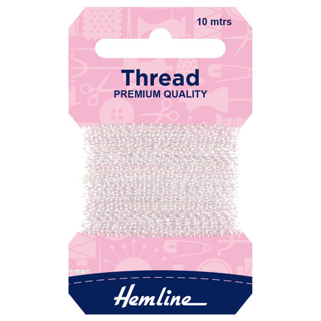 A package of Hemline sewing thread, 10 meters long, wound on a cardboard spool with a pink header card and a navy blue brand label at the bottom.