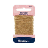 A 10-meter spool of Hemline light gold embroidery thread in its original pink and navy blue retail packaging, shown against a plain white background.