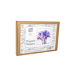 Origami Flowers kit in a brown cardboard box with a white label featuring a purple and pink flower illustration.