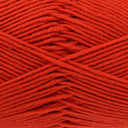 A close-up of bright red yarn strands wound together, showing the texture and colour of the fibre.