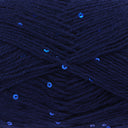 Close-up of dark navy blue yarn with small iridescent blue sequins woven throughout.