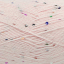 Close-up of pale pink yarn with scattered multicoloured sequins