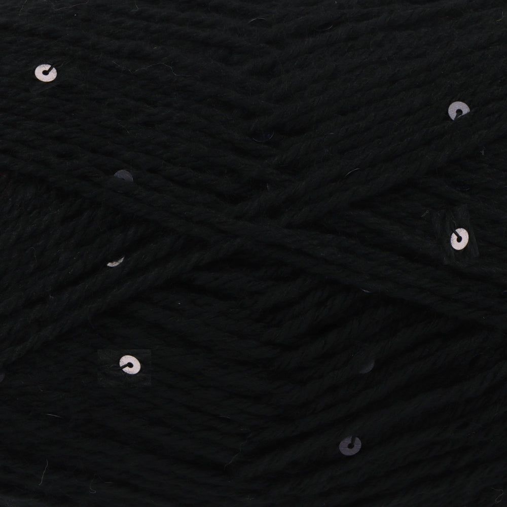 Close-up of black yarn with scattered small silver sequins woven throughout.