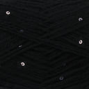 Close-up of black yarn with scattered small silver sequins woven throughout.