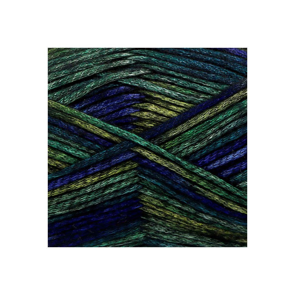 A close-up of variegated yarn strands arranged in an X pattern, showing a colour-shifting effect with shades of dark green, teal, blue, and olive yellow.