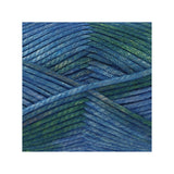 A close-up of variegated yarn strands in shades of blue and green, arranged in a textured pattern on a white background.