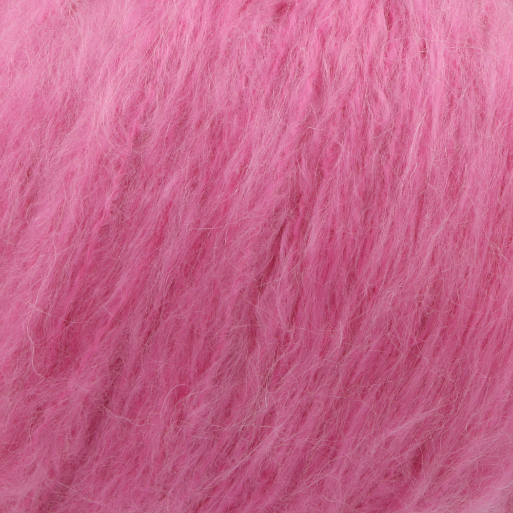 A close-up texture shot of fluffy, soft pink hair fibers, likely mohair or a similar high-pile wool blend.