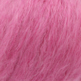 A close-up texture shot of fluffy, soft pink hair fibers, likely mohair or a similar high-pile wool blend.