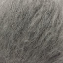 A close-up texture shot of fluffy grey wool, showing the dense, soft fibres.