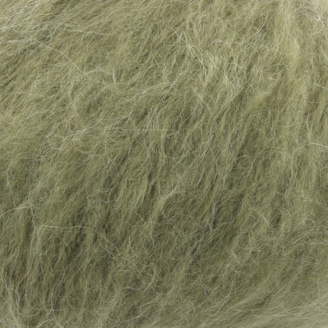 A close-up texture shot of fluffy, curly hair or fibre in a muted olive green colour.