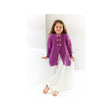 A young girl wearing a purple cable-knit cardigan with gold buttons, white pants, and sandals, standing in a bright white studio setting.