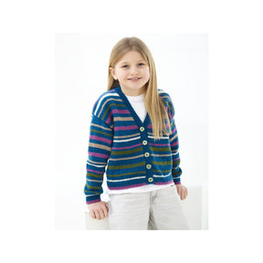 A young girl with long blonde hair wearing a colourful striped knit cardigan over a white t-shirt and light gray pants, standing against a plain white background.