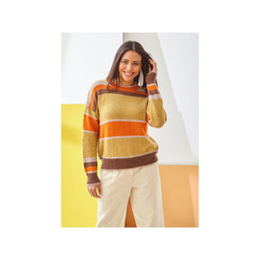 A woman wearing a striped knit sweater with horizontal bands of mustard yellow, orange, and brown, paired with cream-colored pants, standing against a modern geometric studio background of white, yellow, and orange.