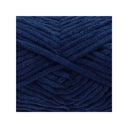 A close-up of thick, plush yarn wound in a crisscross pattern, showcasing its deep navy blue colour and soft, fuzzy texture.