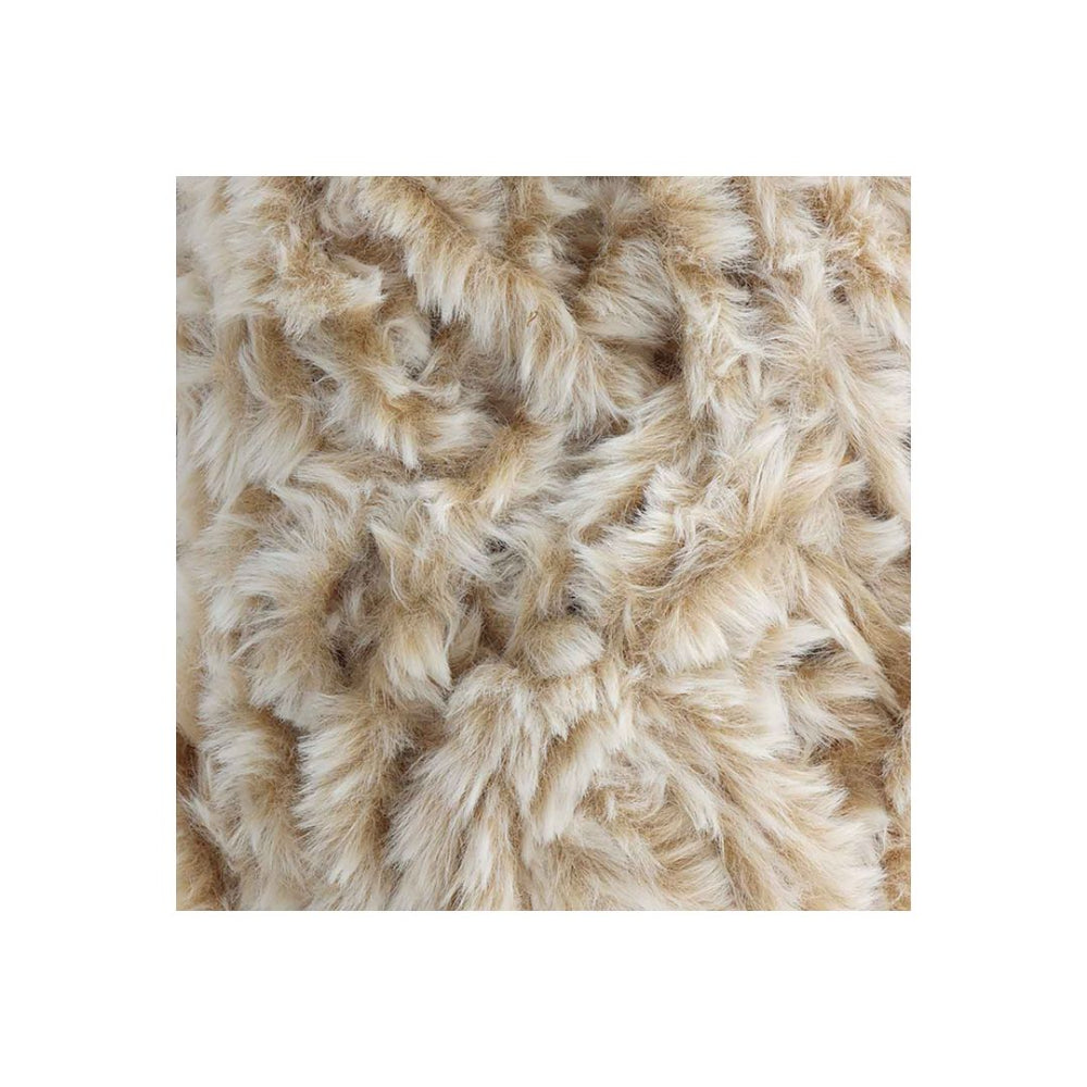 A close-up of a shaggy faux fur or sheepskin-like textile in warm beige and cream tones, centered on a white background.
