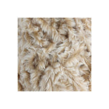 A close-up of a shaggy faux fur or sheepskin-like textile in warm beige and cream tones, centered on a white background.