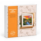 Peak Dala Kinusaiga Kit Bridge craft kit box, featuring a white and orange design with a preview of the colourful framed artwork on the front.