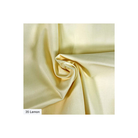 A close-up of draped fabric in a pale lemon yellow colour, with a small label reading '35 Lemon' in the lower-left corner of the fabric area.