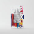Milward crochet accessory set with various hooks and tools in a clear plastic case on a white background.