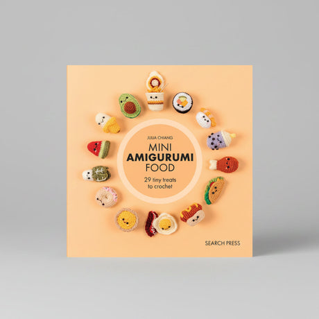 Book cover for 'Mini Amigurumi Food' by Arika Chanda, published by Search Press. The cover features a circular arrangement of small, colourful crocheted food characters on a warm peach background.