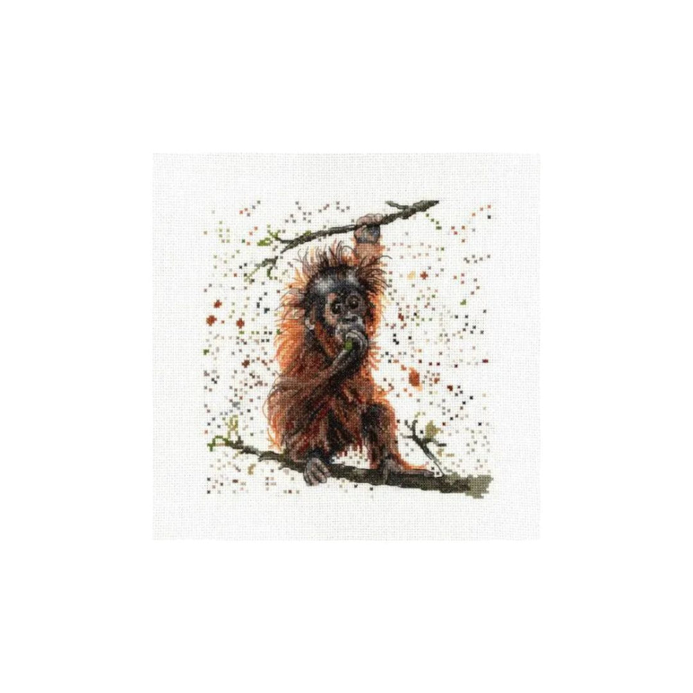 A square art print or canvas featuring a painted brown orangutan hanging from a branch, surrounded by small paint splatters on a white background.