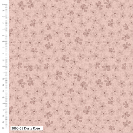 Floral patterned fabric with a ruler on the side on a pink background