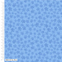 Blue fabric with floral pattern and ruler for scale