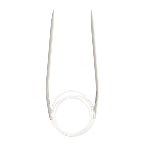 White circular knitting needles with a coiled transparent cable, shown on a solid white background.