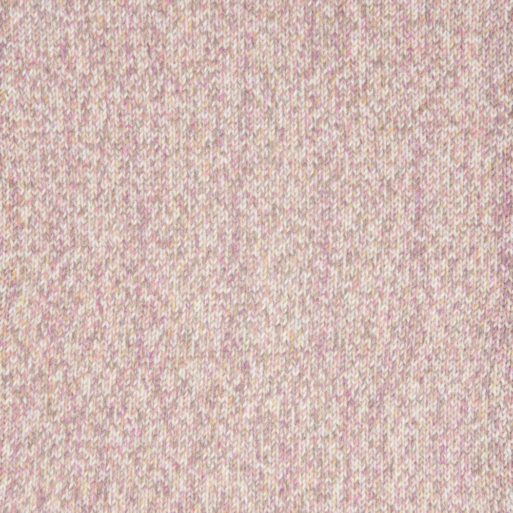 A close-up of a textured knit fabric in a heathered light pink and beige colorway.