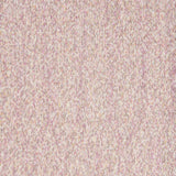 A close-up of a textured knit fabric in a heathered light pink and beige colorway.